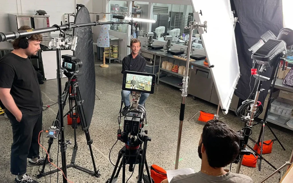 A professional video crew on location in Calgary, capturing a scene for a commercial project.