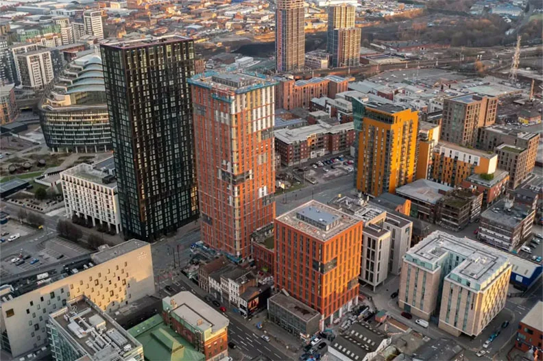 Drone capturing construction progress from above