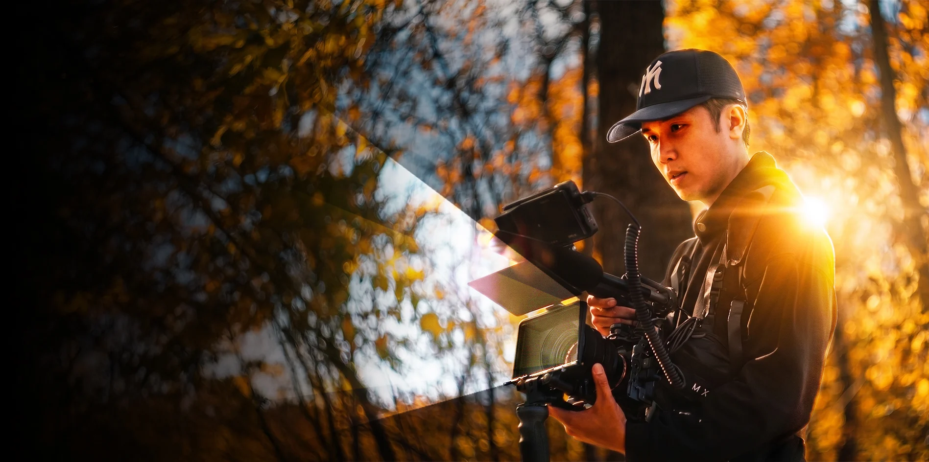 Jared Ho of Storimatic Studio operating a cinema camera on location in Calgary