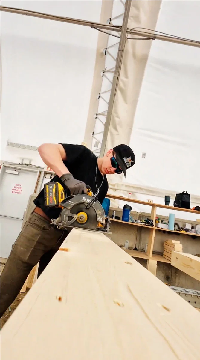 Sawback Builders owners on a framing site