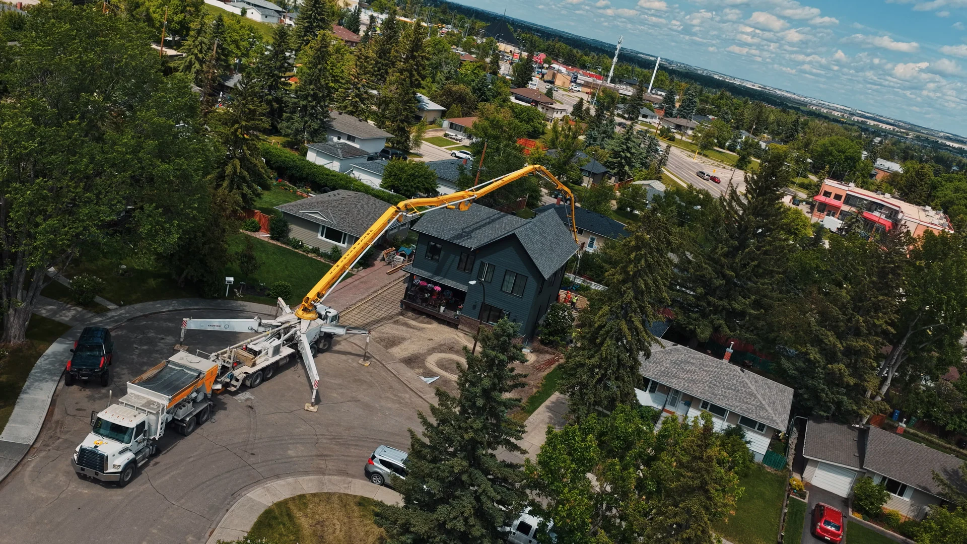 Omega 2000 crew placing concrete in Calgary