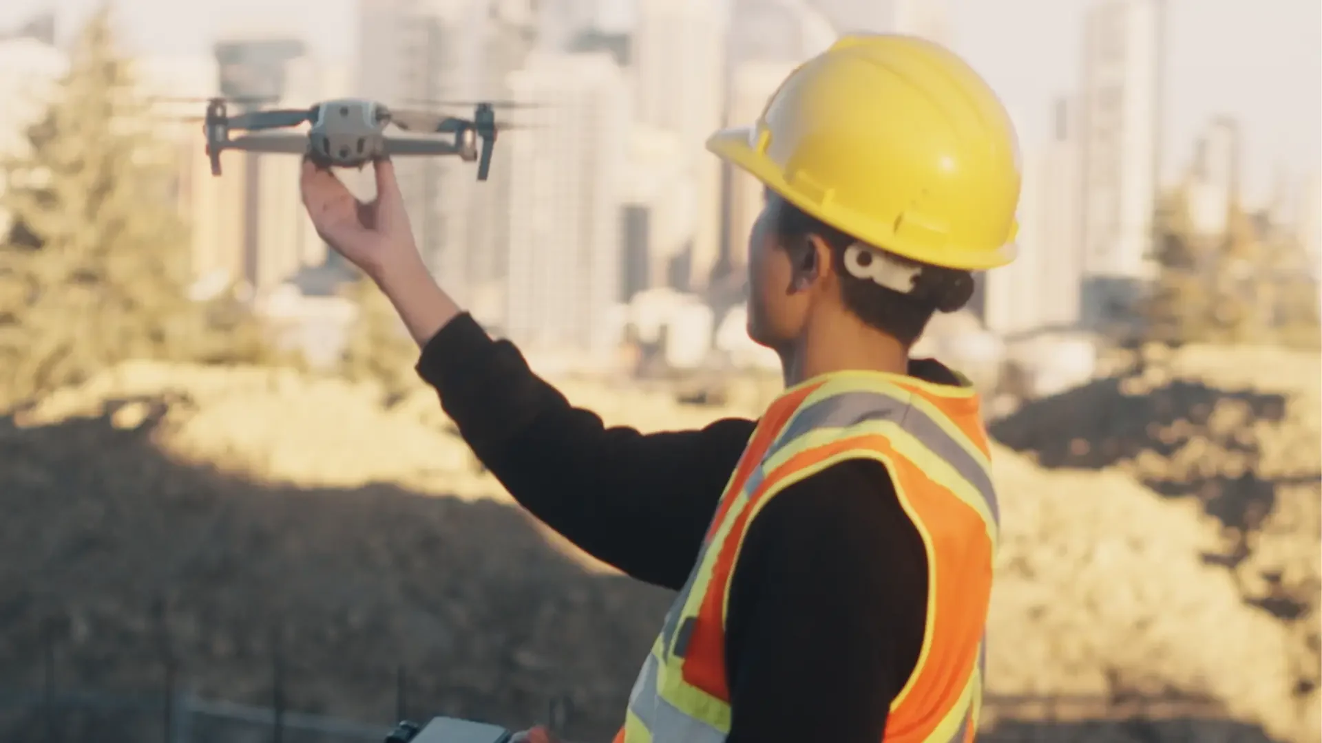 Man wearing a helmet during filming of Safety Induction Videos at a construction site.